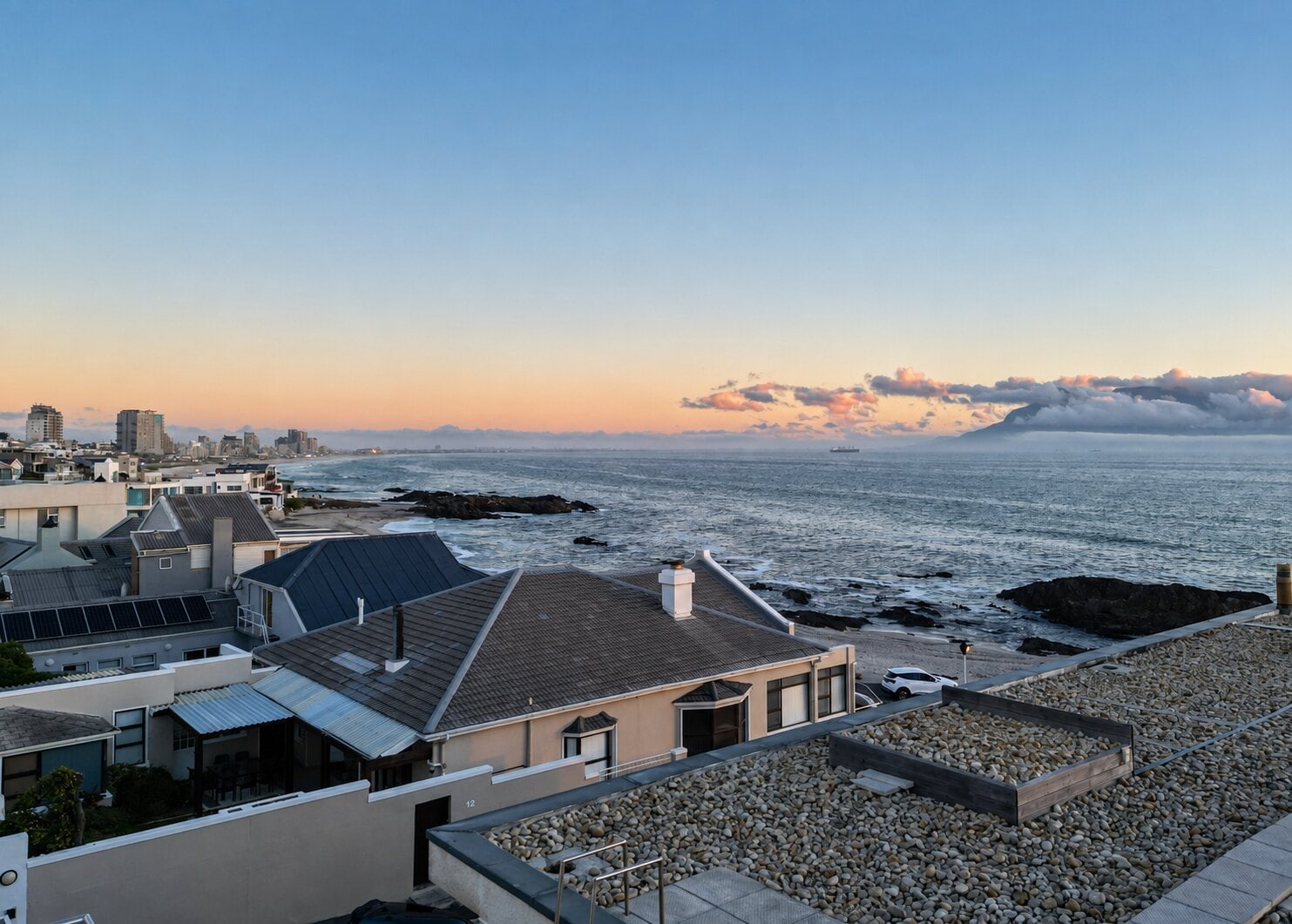 Dusk over the Atlantic at Bloubergstrand with Table Mountain across the bay